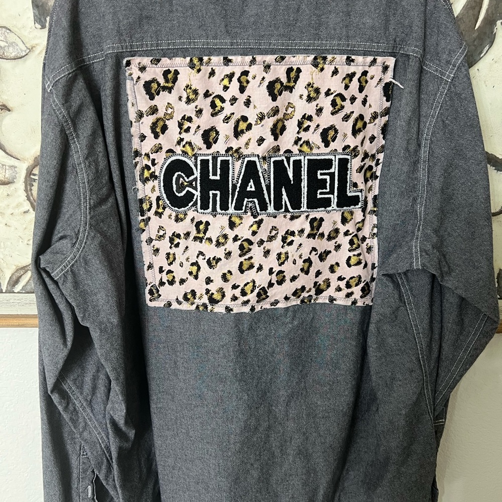 Women’s charcoal grey denim with Chanel patch on back